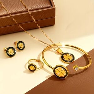 NWT stainless steel - Gold Four-Leaf Clover Necklace and Jewelry Set